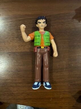 Pokemon Brock Action Figure with Green Vest and Brown Pants